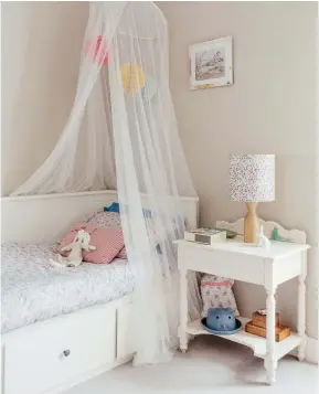  ??  ?? Below left: The daybed in Isla’s room is from Ikea, and the lamp and bedlinen, handmade from Liberty fabric, are from Poppy & Honesty