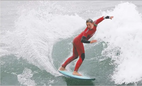  ?? SILVIA IZQUIERDO/AP PHOTO, FILE ?? Canada’s Bethany Zelasko competes in the opening round of women’s surfing during the Pan American Games in Lima, Peru, back in July.