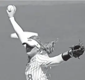  ?? SARAH PHIPPS/THE OKLAHOMAN ?? OSU’s Lexi Kilfoyl throws a pitch in the first inning of a 6-0 win against Minnesota on Saturday at Cowgirls Stadium.