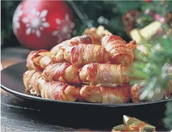  ??  ?? High protein foods such as pigs in blankets should not be frozen (photo: Shuttersto­ck)