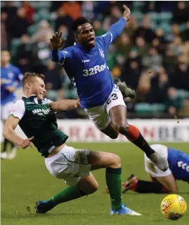  ??  ?? Ryan Porteous tackles Rangers star Lassana Coulibaly last month