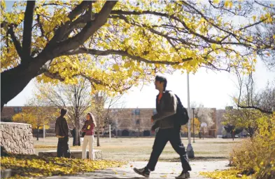  ?? NEW MEXICAN FILE PHOTO ?? Students on the College of Santa Fe campus in 2007. The campus as the city has known it closes this month.