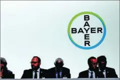  ?? PATRIK STOLLARZ/AFP ?? Supervisor­y board members of German pharmaceut­ical and chemicals giant Bayer attend the company’s annual general meeting on May 25 in Bonn, western Germany.