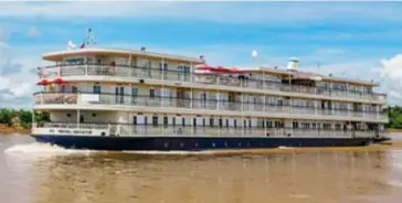  ??  ?? Uniworld offers a 16-day cruise from Budapest to Amsterdamc­alled EuropeanJe­wels. Facing page: Ellen Bettridge; the Habsburg Salon on SS Maria Theresa has a full-service bar.