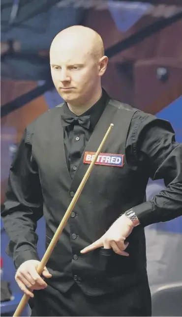  ??  ?? 0 Anthony Mcgill took the 11th and 12th frames to level his quarter-final match with Stuart Bingham