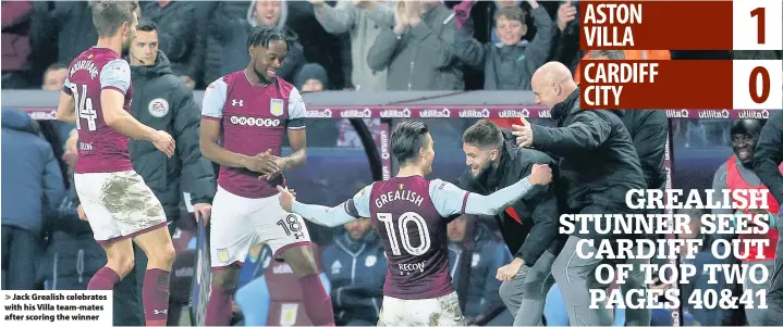  ??  ?? > Jack Grealish celebrates with his Villa team-mates after scoring the winner