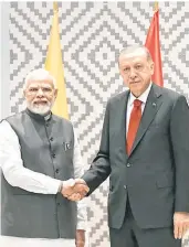  ?? —PTI ?? Prime Minister Narendra Modi with President of Turkiye Recep Tayyip Erdogan during a meeting on the sidelines of SCO Summit
in Samarkand, Uzbekistan, on Friday