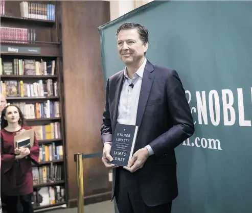  ?? DREW ANGERER / GETTY IMAGES ?? Former FBI Director James Comey poses for photograph­s as he arrives to speak about his new book A Higher Loyalty: Truth, Lies, and Leadership at Barnes & Noble bookstore last week in New York City.
