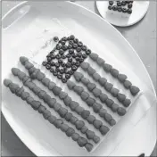  ?? CARL TREMBLAY/AMERICA’S TEST KITCHEN VIA AP ?? THIS UNDATED PHOTO provided by America’s Test Kitchen in May 2018 shows a U.S. flag cake in Brookline, Mass. This recipe appears in the cookbook “The Perfect Cake.”