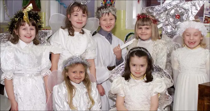  ??  ?? December 2000 - Nicole Campbell and Sarah O’Malley with (Back L-R) Alishea Sammon, Clodagh O’Riordan, James Stewart, Naomi McGuinness and Ciara Thompson who took part in the CBS National School Nativity Play.