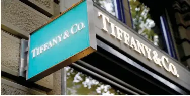  ?? Reuters ?? ↑
The logo of Tiffany at a shopping street in Zurich, Switzerlan­d.