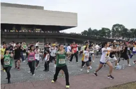  ??  ?? Participan­ts do morning exercises to kick off the Earth Day celebratio­n Photo from culturalce­nter.gov.ph.