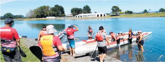  ?? Photo / Supplied ?? A group of community members learning how to man a 12-person waka on a “give it a go” day at the Heretaunga Waka Ama club in early January.