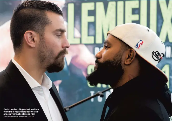  ??  ?? David Lemieux (à gauche) avait du feu dans le regard lors de son faceà-face avec Curtis Stevens, hier.