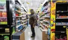  ?? Photograph: Jon Cherry/ The Guardian ?? Brett St. Amand shops for food in a Dollar General grocery store in Georgetown, Kentucky.