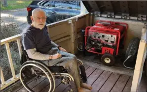  ?? (File Photo/AP/Terry Chea) ?? Richard Skaff, a paraplegic who is an advocate for the disabled, talks March 9 about his backup generator at his home in Guernevill­e, Calif.