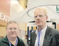  ??  ?? James Alan Rowan, left, with actor Ed Begley Jr. in a video promoting Enviro-Energies’ vertical-axis wind turbine technology.