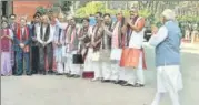  ?? PTI ?? BJP leaders greet Prime Minister Narendra Modi as he arrives to attend the budget session of Parliament on Monday.