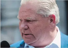  ?? MARTA IWANEK THE CANADIAN PRESS ?? Ontario Premier-designate Doug Ford says he stands “shoulder to shoulder” with Justin Trudeau over G7 and trade.