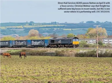  ?? ERIC WISEMAN. ?? Direct Rail Services 66305 passes Natton on April 8 with a Tesco service. Christian Wolmar says that freight has suffered some big losses in recent weeks, but this is one sector where it is performing well.