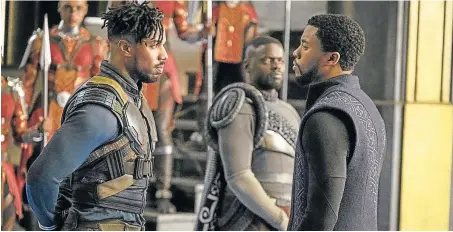  ??  ?? CLAWS ARE OUT: Chadwick Boseman and Michael B Jordan battle it out in ‘Black Panther’