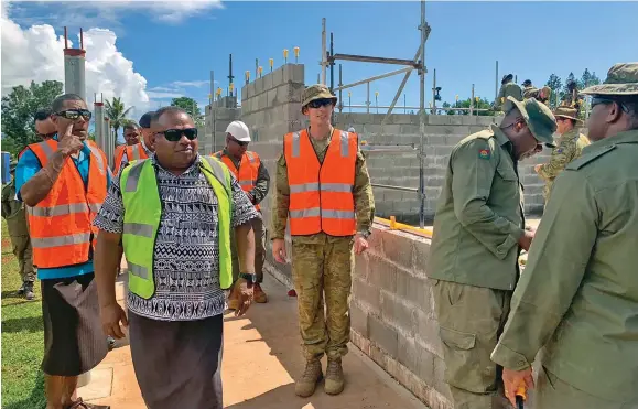  ?? ?? Minister of Rural and Maritime Developmen­t and Disaster Management Inia Seruiratu with the Republic of Fiji Military Forces (RFMF) and Australian Defence Force (ADF), French and Kiwi engineers and soldiers at Lekutu Secondary School in Bua on May 4, 2022.