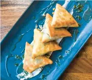  ?? ?? Spanakopit­a is available at Meli European Taverna.