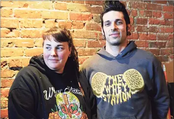  ?? Cassandra Day / Hearst Connecticu­t Media ?? Jillian Moskites, left, with her husband Josh, own the Whey Station food truck and Whey Station(ary) restaurant in Middletown.