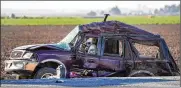  ??  ?? Thirteen of the 25 people in this SUV were killed Tuesday when when it collided with a semi-truck near the Mexican border in Holtville, California.