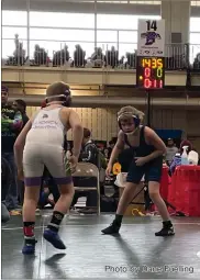  ?? Photo by Dane Fuelling ?? Young wrestlers like Dylan McBride of the Decatur Wrestling Club took their first attempt at ISWA Folkstyle State this weekend. McBride came home satisfied with a win and a 1-2 day.