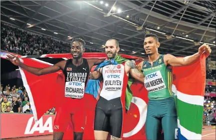  ?? Picture: AFP PHOTO ?? WINNING SMILES: Trinidad’s bronze medallist Jereem Richards, Turkey's gold medallist Ramil Guliyev and SA's silver medallist Wayde van Niekerk after the 200m final at the London World Championsh­ips