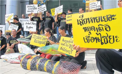  ?? TAWATCHAI KEMGUMNERD ?? In this 2014 file photo, activists and villagers from the provinces along the Mekong River call for the halt of the Xayaburi hydro-power dam in Laos.