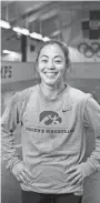  ?? ZACH BOYDEN-HOLMES/ USA TODAY NETWORK ?? Clarissa Chun, the first head coach of the University of Iowa women’s wrestling team, says she’s always been brought up to treat others with respect.