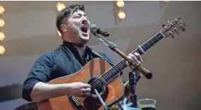  ?? HARRIS/INVISION/AP AMY ?? Marcus Mumford, of Grammy-winning folk-rock band Mumford & Sons, co-write the music and theme song for the Apple TV+ series, “Ted Lasso.”