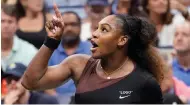  ??  ?? Serena Williams makes her point before being docked a game during the US Open final