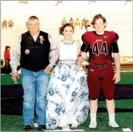  ??  ?? Lincoln junior maid Maddie Raines, granddaugh­ter of Sheila Raines, escorted by her uncle, Steven Phillips; and senior Bradley Drain, son of Troy and Becky Drain.