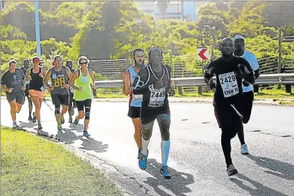  ?? Picture: SIBONGILE NGALWA ?? GIVING IT THEIR ALL: Some of the runners who participat­ed in the East London Eye Hospital Laser Challenge 5km and 10km race which started at the Beacon Bay Country Club last year