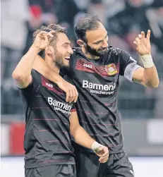  ?? ARCHIVFOTO­S: IMAGO (6), DPA (2) ?? Hakan Calhanoglu und Ömer Toprak (r.) werden in Zukunft nicht mehr gemeinsam jubeln – jedenfalls nicht mehr im Trikot von Bayer 04.