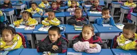  ?? ADAM DEAN / THE NEW YORK TIMES ?? Would American parents embrace Chinese education approaches, which include large class sizes, high-stakes testing and hours of homework?