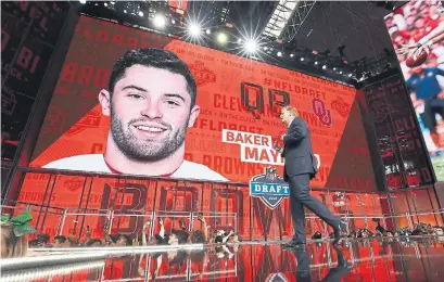  ?? RONALD MARTINEZ/GETTY IMAGES ?? The Cleveland Browns made Oklahoma quarterbac­k Baker Mayfield the No. 1 pick in the NFL draft on Thursday night.