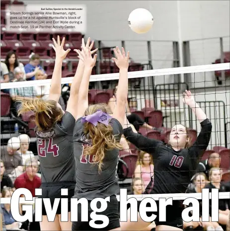  ?? Bud Sullins/Special to the Herald-Leader ?? Siloam Springs senior Allie Bowman, right, goes up for a hit against Huntsville’s block of Destinee Harmon (24) and Cori Wylie during a match Sept. 19 at Panther Activity Center.