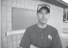  ?? TAYLOR CAMPBELL ?? John Downes, president of Windsor South Little League, stands in front of the league’s concession stand twice targeted by thieves.