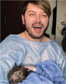  ?? ?? New father: Brian Dowling with daughter Blake Maria