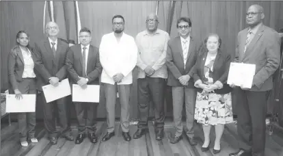  ?? ?? From left are Diana Rajcumar, Rajnarine Singh, Joel Bhagwandin, President Irfaan Ali, Prime Minister Mark Phillips, Attorney General Anil Nandlall, Minister of Governance Gail Teixeira and Berkley Wickham after the July 1st swearing in at the Office of the President.