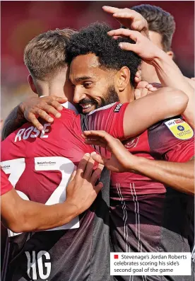  ?? ?? ■ Stevenage’s Jordan Roberts celebrates scoring his side’s second goal of the game