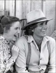  ?? EI SCAN ?? Melissa Gilbert with her TV father on Little House on the Prairie, the late Michael Landon. Gilbert played the role of Laura Ingalls Wilder.