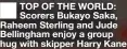  ?? ?? TOP OF THE WORLD: Scorers Bukayo Saka, Raheem Sterling and Jude Bellingham enjoy a group hug with skipper Harry Kane