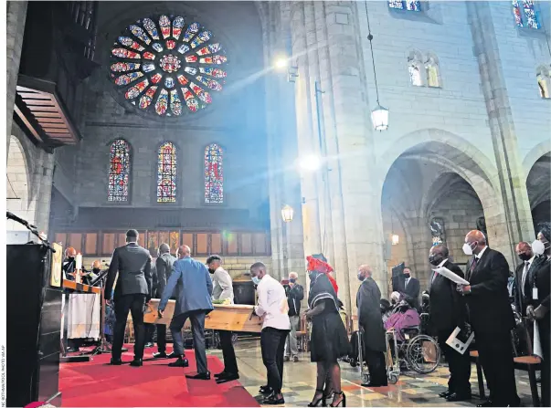  ?? ?? The funeral service at St G George’s Cathedral in Cape Town yesterday for Anglican Archbishop Desmond Tutu, left, where warm tributes were paid to the Nobel Peace Prize winner, who died aged 90