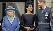  ?? Matt Dunham Associated Press ?? QUEEN Elizabeth II, Meghan the Duchess of Sussex and Prince Harry in 2018 at Buckingham Palace.
