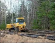  ?? TANIA BARRICKLO — DAILY FREEMAN FILE ?? Train tracks are removed along Route 28 in Shokan last week.